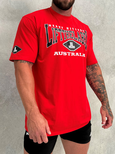 Home Tee in red, mens gym tee by Lift The Label, side view on male model